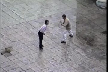 Multiple drunk participants fight it out in a square
